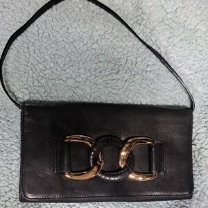 Michael Kors Black and Gold Clutch with Sleek Design